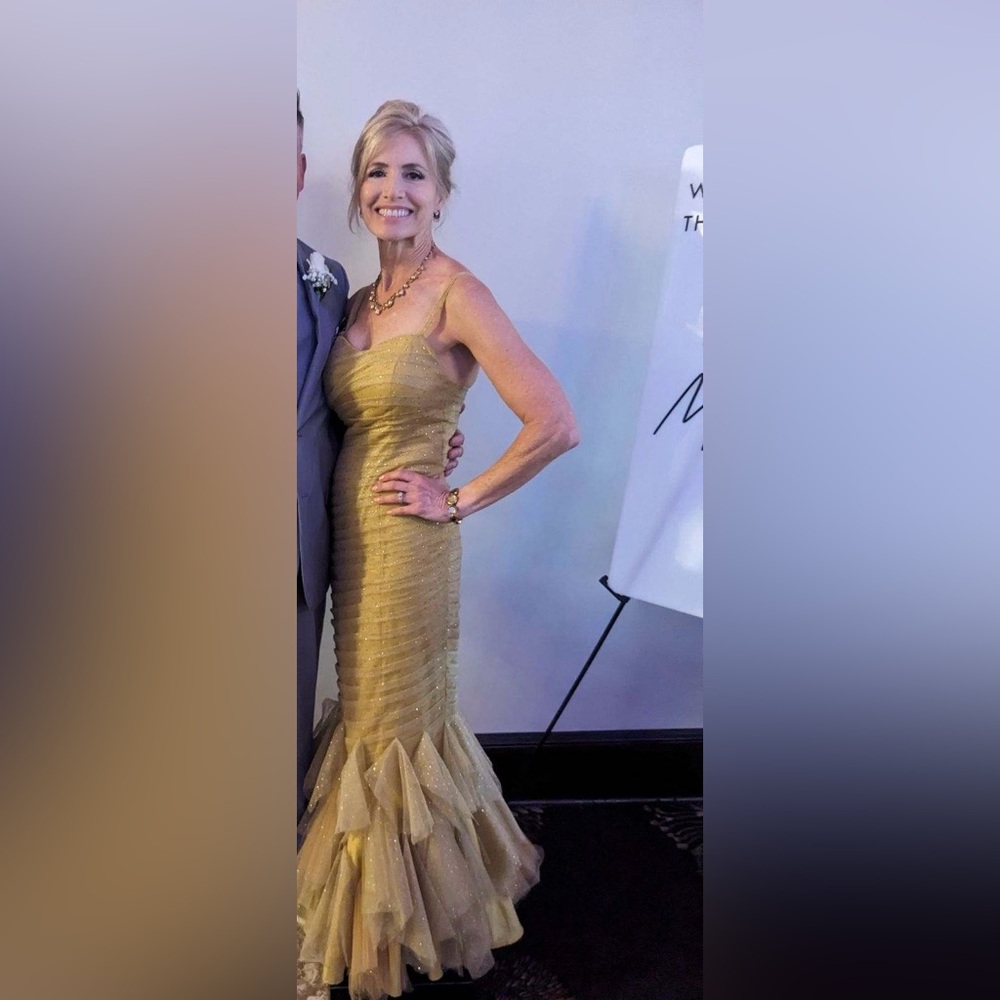 Gold strapless mermaid-style formal gown with a ruffled tulle skirting - Picture 4 of 11